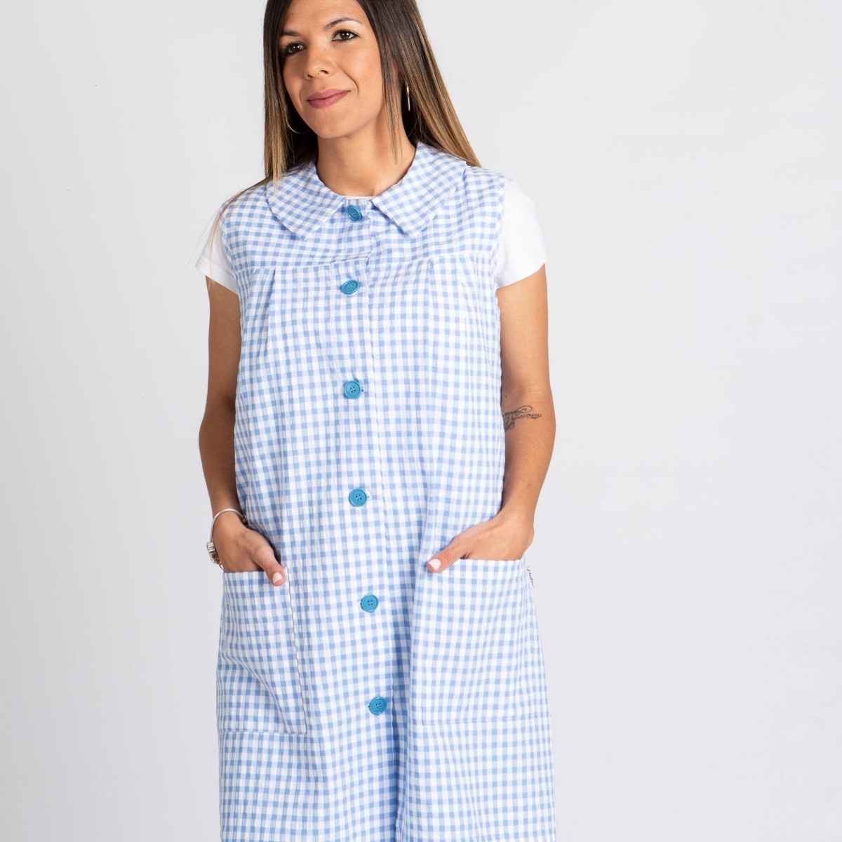 BATA COLEGIAL SIN MANGAS